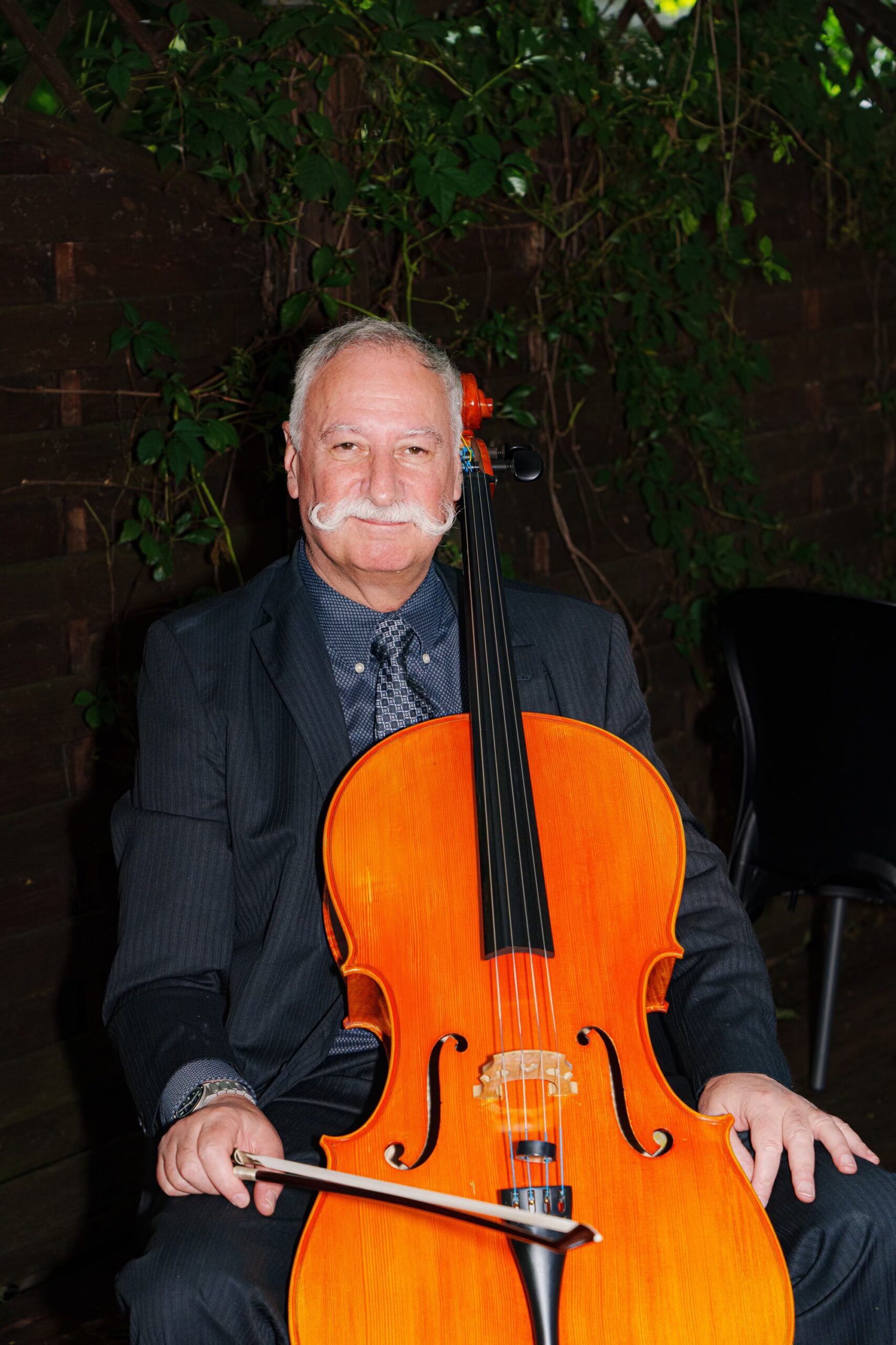 Richard Wyce cellist At the cello