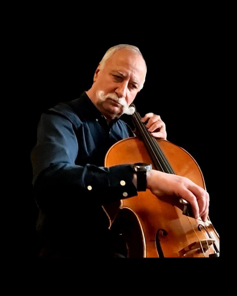 Richard Wyce playing cello Man with a white handlebar mustache playing a cello demonstrating instrument quality
